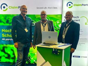 Matthias Hummel, Oliver Hallstein und Uwe Gebecke präsentieren ClaimParts auf der Autoverwerter-Tagung 2022.